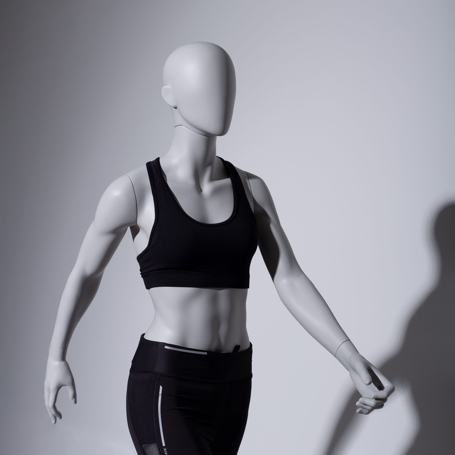 Trekking sport mannequin, female, grey, abstract head, standing pose 23