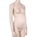 Pregnant belly, soft PU, off white color