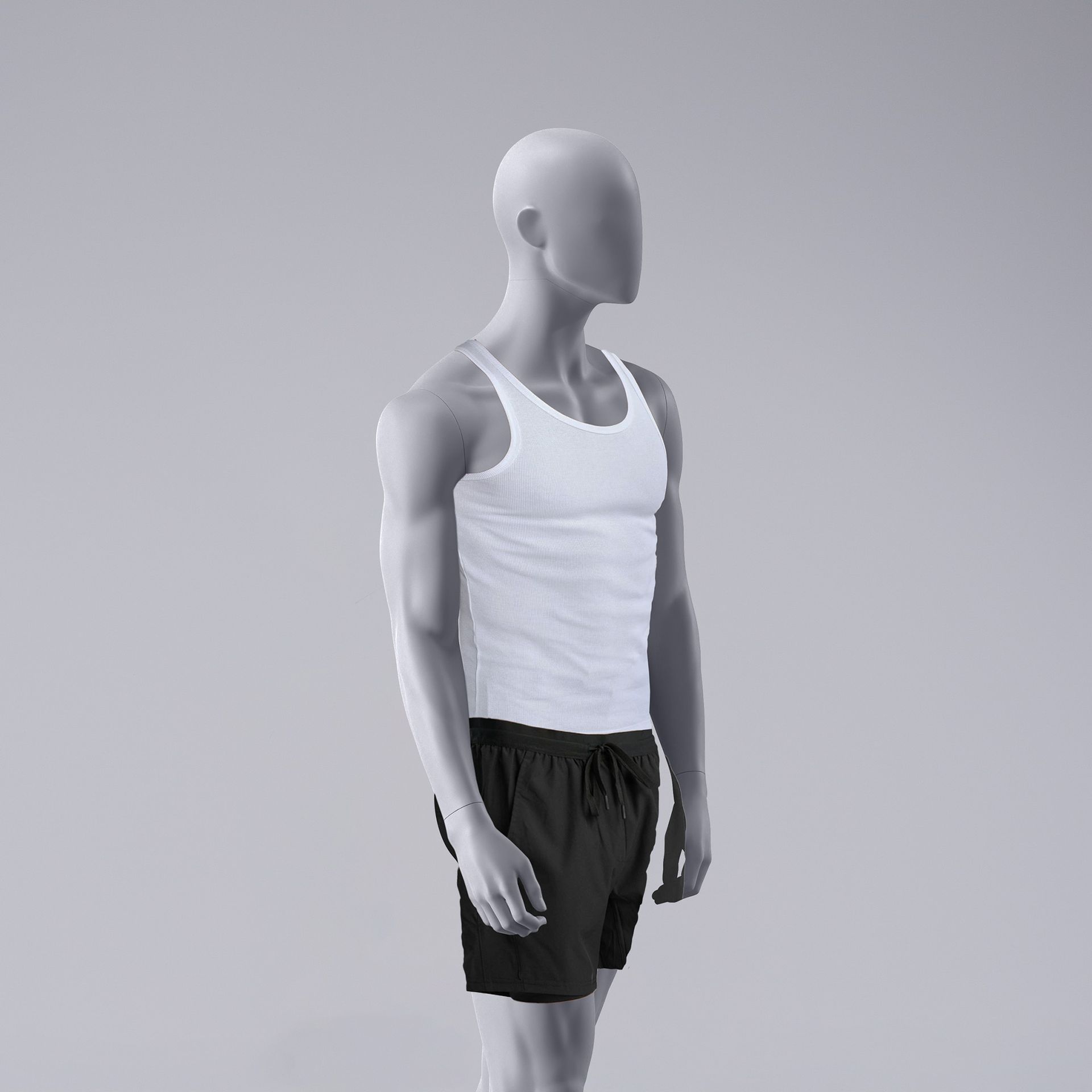 Sport mannequin, male, grey, abstract head, standing pose 329