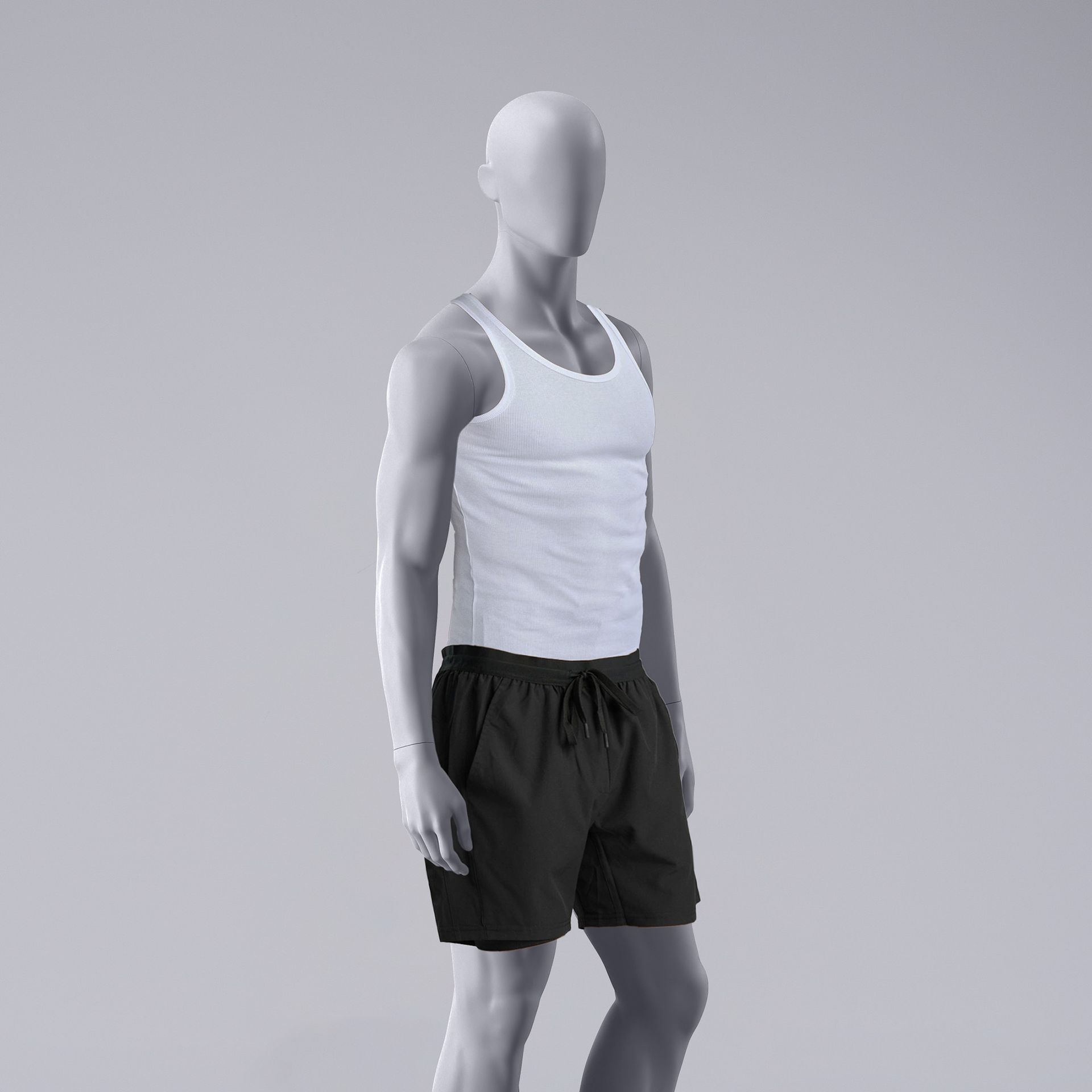 Maniquí de deporte hombre, gris, cabeza abstracta, postura de pie 330